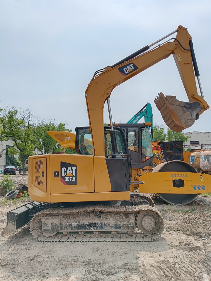 CATERPILLAR 307.5 CAT 307D 307E2 312D2GC - Minikotró: 3 kép. CATERPILLAR 307.5 CAT 307D 307E2 312D2GC - Minikotró: 3 kép.