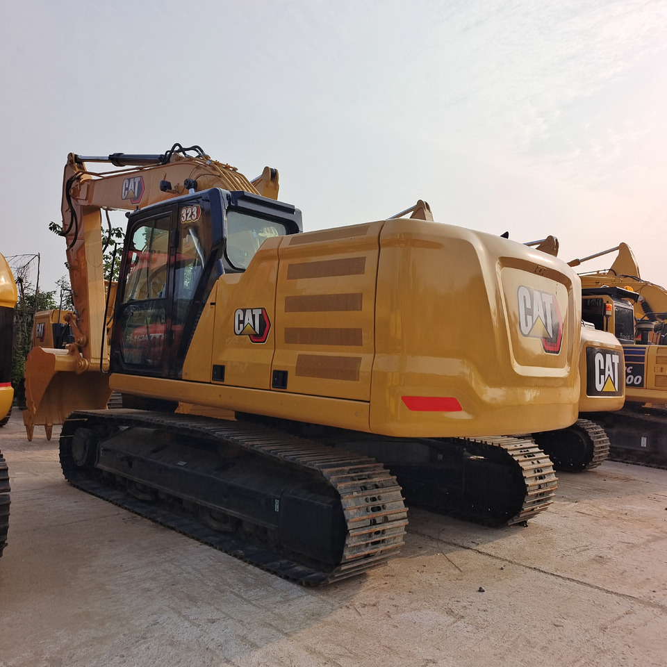 CATERPILLAR 323 GC CAT 323 323GC - Lánctalpas kotró: 1 kép. CATERPILLAR 323 GC CAT 323 323GC - Lánctalpas kotró: 1 kép.