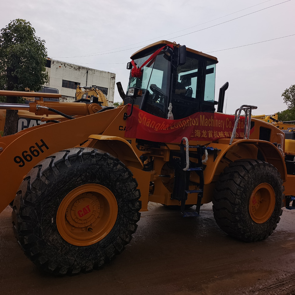 CATERPILLAR 966H CAT 966 H 950GC 950H - Gumikerekes homlokrakodó: 3 kép. CATERPILLAR 966H CAT 966 H 950GC 950H - Gumikerekes homlokrakodó: 3 kép.