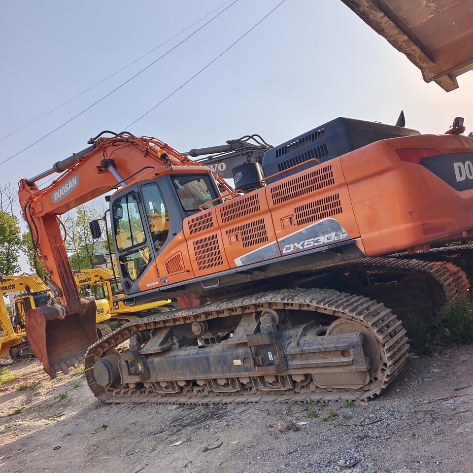 DOOSAN DX530LC-5 - Lánctalpas kotró: 1 kép. DOOSAN DX530LC-5 - Lánctalpas kotró: 1 kép.