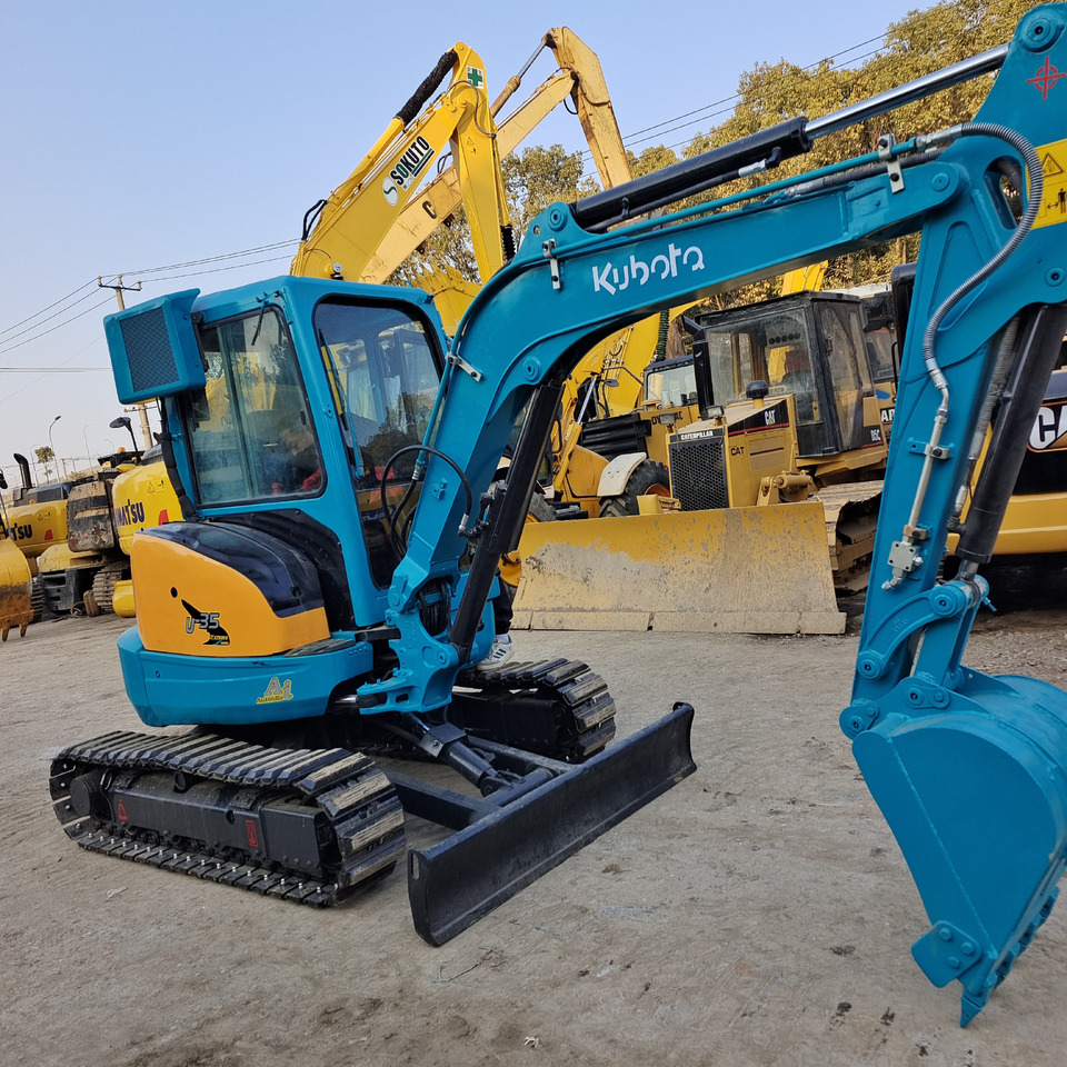 Minikotró KUBOTA U35: 6 kép.