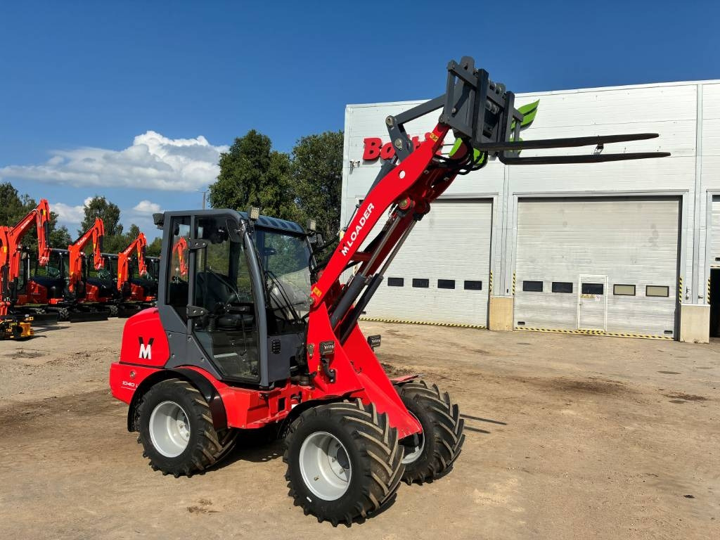 VM Loader 1040LXC - Derékcsuklós rakodó: 2 kép. VM Loader 1040LXC - Derékcsuklós rakodó: 2 kép.