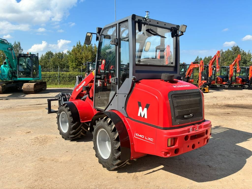 VM Loader 1040LXC - Derékcsuklós rakodó: 3 kép. VM Loader 1040LXC - Derékcsuklós rakodó: 3 kép.