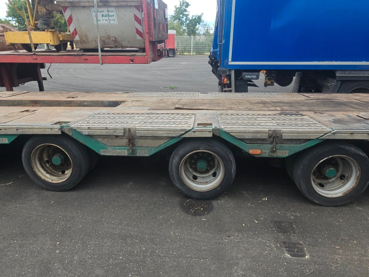 Meusburger MPG-4 Tieflader mit Radmulden 39.5t - Félpótkocsi mélybölcsős: 5 kép. Meusburger MPG-4 Tieflader mit Radmulden 39.5t - Félpótkocsi mélybölcsős: 5 kép.