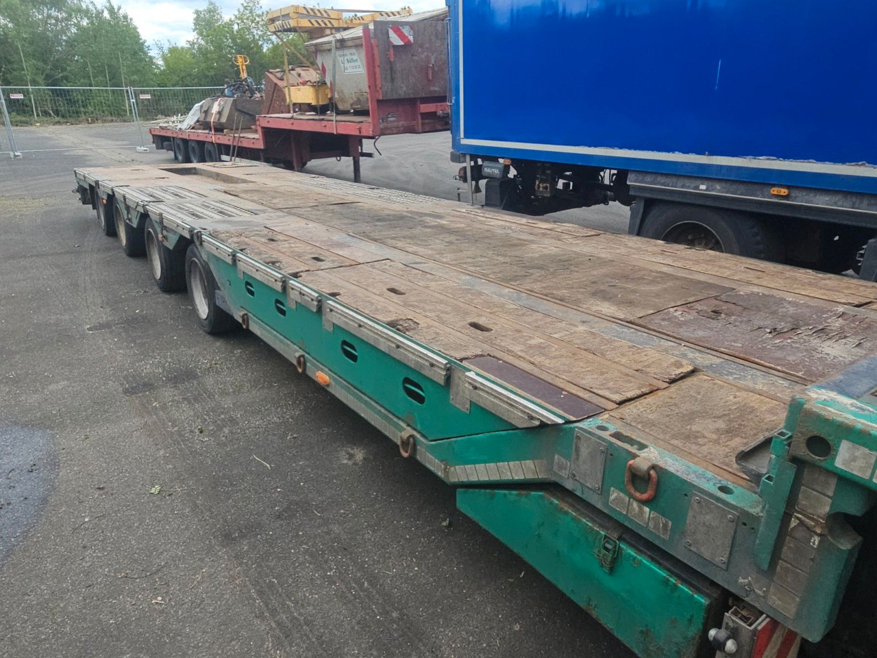 Meusburger MPG-4 Tieflader mit Radmulden 39.5t - Félpótkocsi mélybölcsős: 4 kép. Meusburger MPG-4 Tieflader mit Radmulden 39.5t - Félpótkocsi mélybölcsős: 4 kép.
