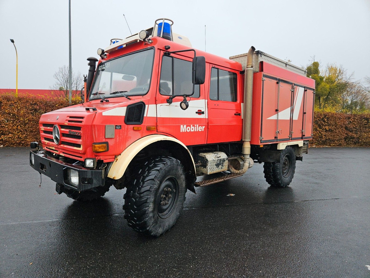 Unimog U4000 4x4 DOKA Tanklöschfahrzeug Feuerwehr - Tartályos teherautó: 1 kép. Unimog U4000 4x4 DOKA Tanklöschfahrzeug Feuerwehr - Tartályos teherautó: 1 kép.