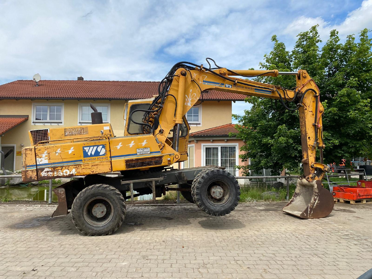 Atlas AB 1604 - Gumikerekes kotró: 3 kép. Atlas AB 1604 - Gumikerekes kotró: 3 kép.