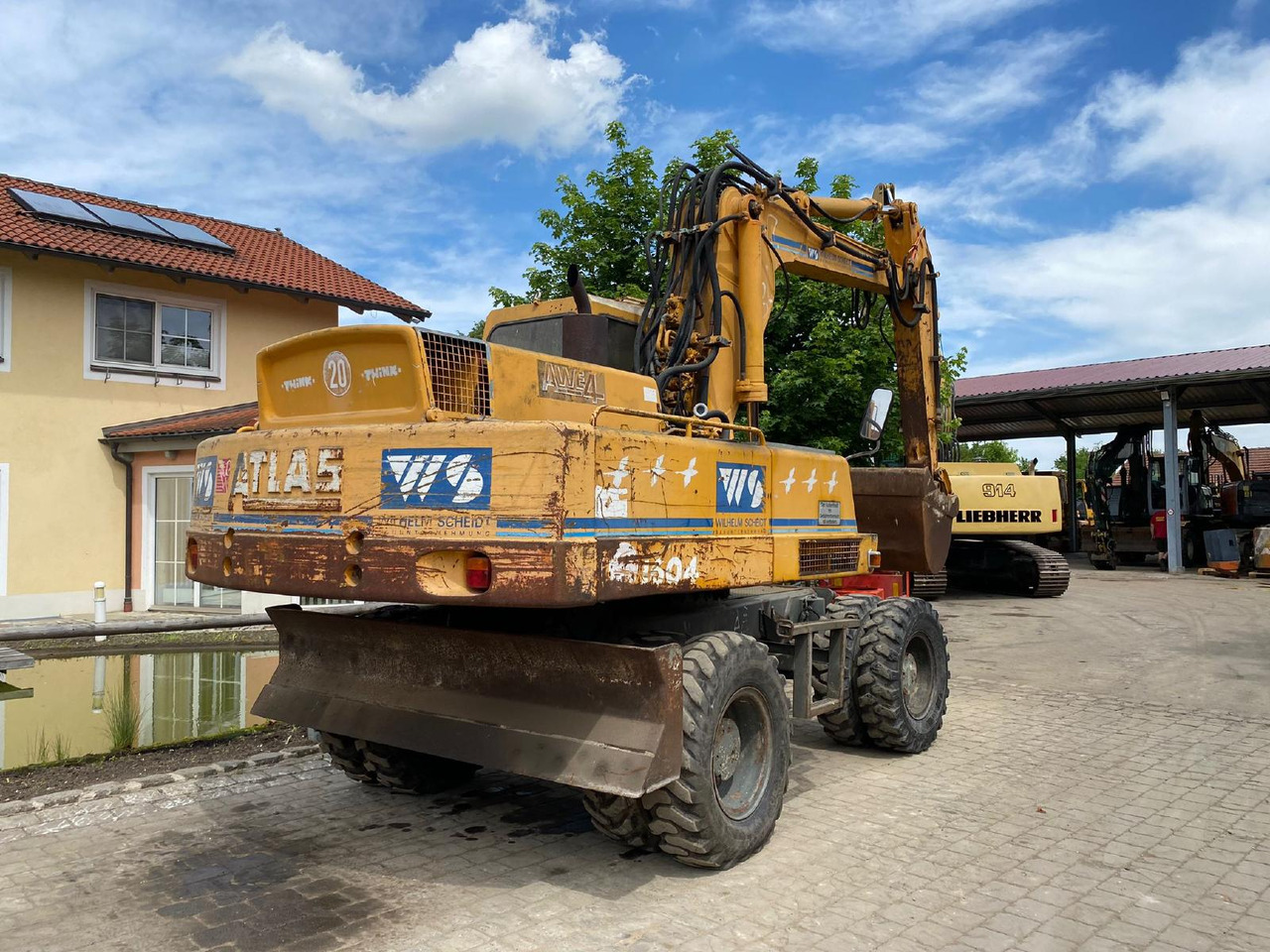 Atlas AB 1604 - Gumikerekes kotró: 4 kép. Atlas AB 1604 - Gumikerekes kotró: 4 kép.