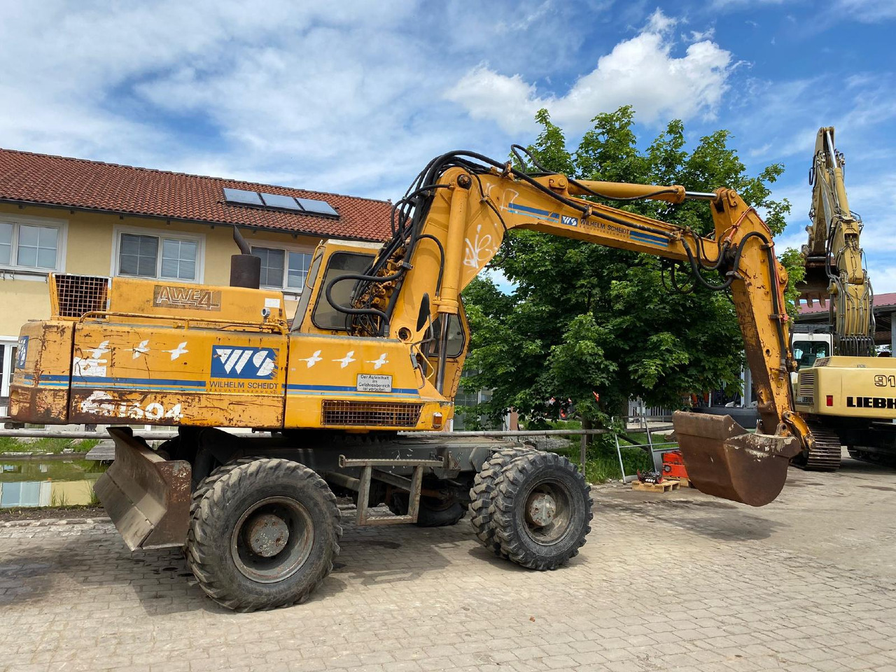 Gumikerekes kotró Atlas AB 1604: 9 kép.