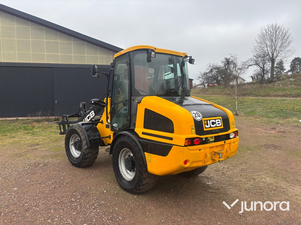 Hjullastare - JCB 407 SV - Gumikerekes homlokrakodó: 3 kép. Hjullastare - JCB 407 SV - Gumikerekes homlokrakodó: 3 kép.