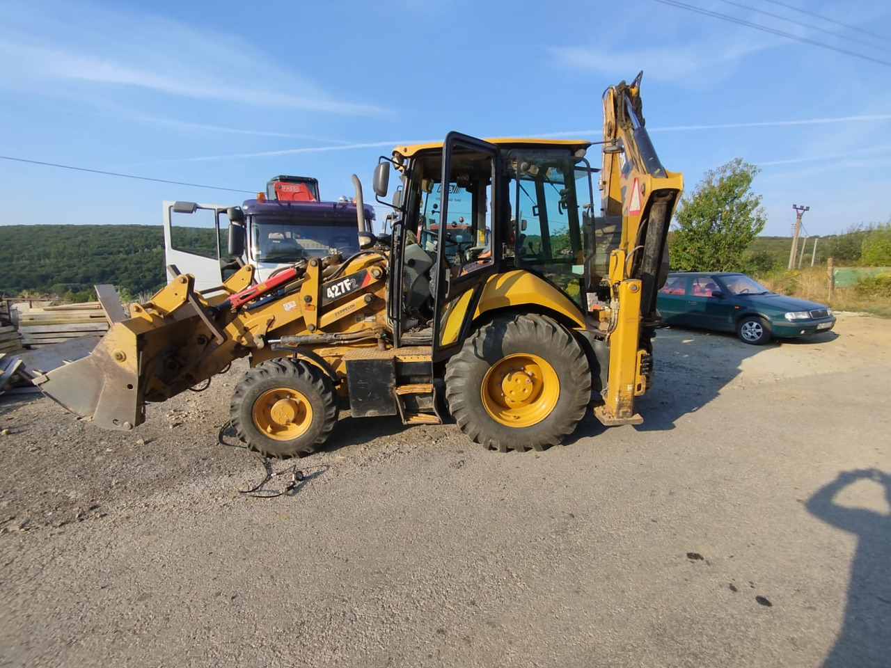 CATERPILLAR 472F2 - Kotrórakodó: 1 kép. CATERPILLAR 472F2 - Kotrórakodó: 1 kép.