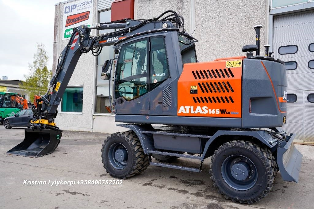 Atlas 165WSR VARUSTELTU - Gumikerekes kotró: 2 kép. Atlas 165WSR VARUSTELTU - Gumikerekes kotró: 2 kép.