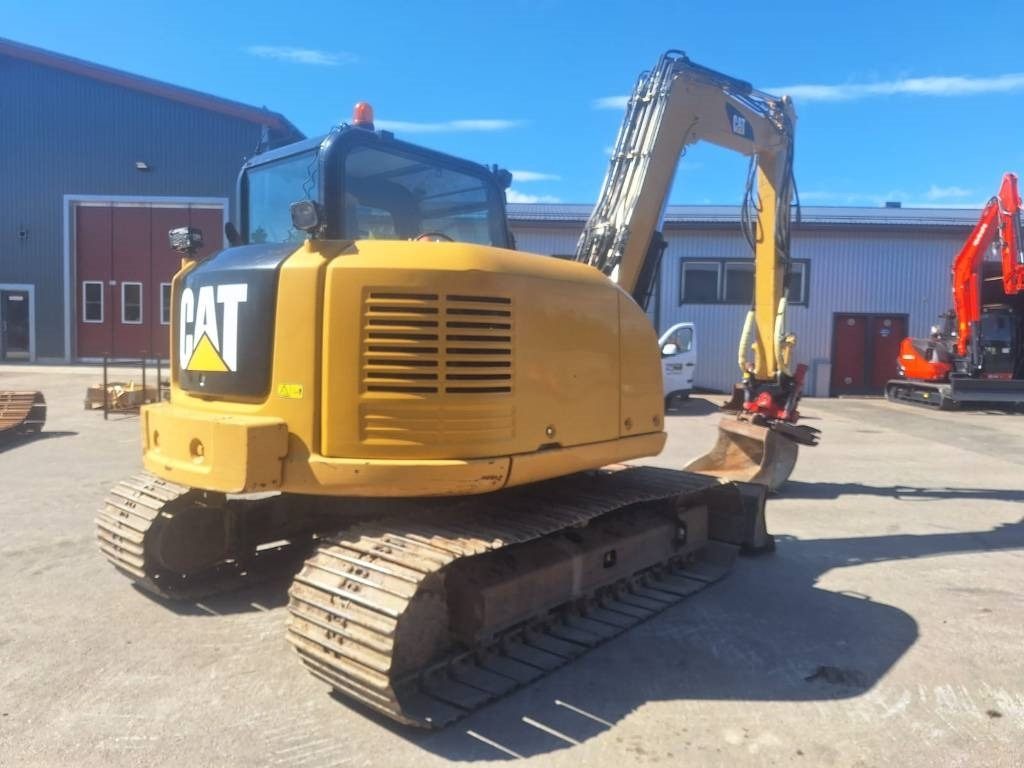 CAT 308E PYÖRITTÄJÄLLÄ - Minikotró: 4 kép. CAT 308E PYÖRITTÄJÄLLÄ - Minikotró: 4 kép.