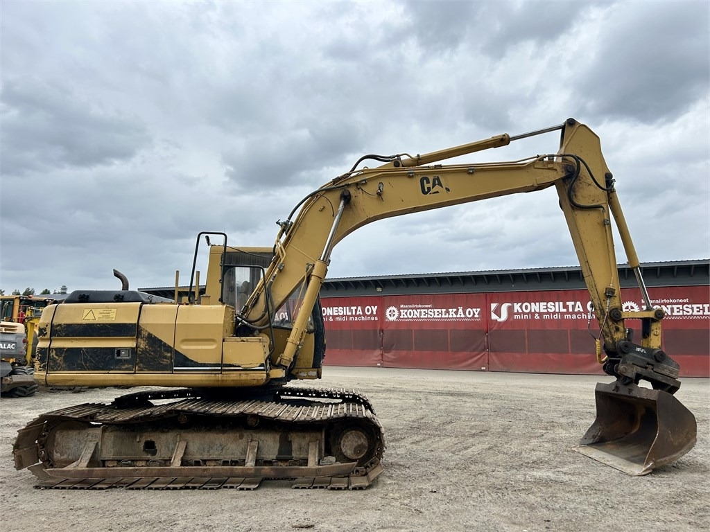 CAT 317 - Lánctalpas kotró: 5 kép. CAT 317 - Lánctalpas kotró: 5 kép.