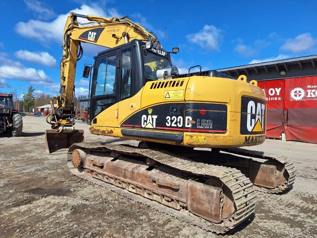 CAT 320DLRR PYÖRITTÄJÄLLÄ - Lánctalpas kotró: 2 kép. CAT 320DLRR PYÖRITTÄJÄLLÄ - Lánctalpas kotró: 2 kép.