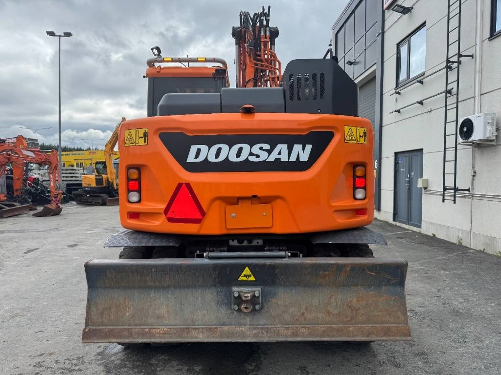 Doosan DX 165 W-5 - Gumikerekes kotró: 4 kép. Doosan DX 165 W-5 - Gumikerekes kotró: 4 kép.