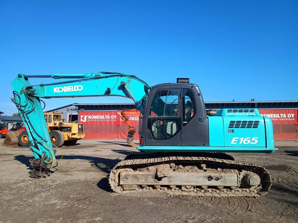 Fiat-Kobelco E165LC KALLISTAJALLA - Lánctalpas kotró: 1 kép. Fiat-Kobelco E165LC KALLISTAJALLA - Lánctalpas kotró: 1 kép.