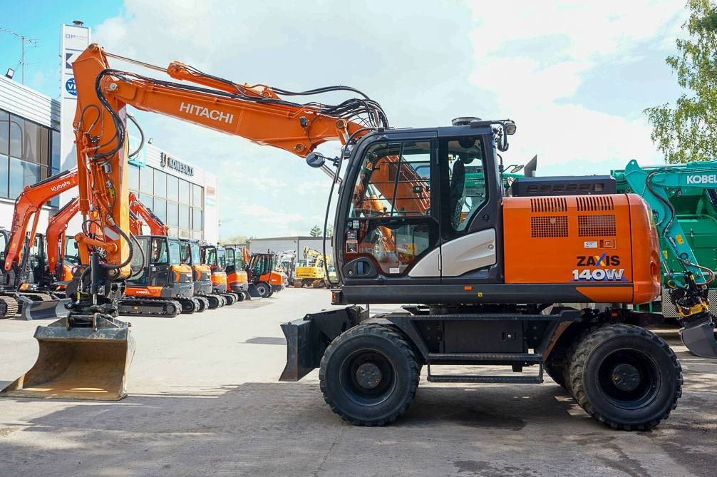 Hitachi ZX 140 W-6 - Gumikerekes kotró: 1 kép. Hitachi ZX 140 W-6 - Gumikerekes kotró: 1 kép.