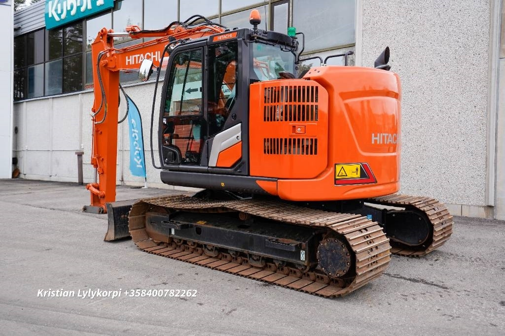 Hitachi ZX135US-7 PUSKULEVY STAGE V - Lánctalpas kotró: 2 kép. Hitachi ZX135US-7 PUSKULEVY STAGE V - Lánctalpas kotró: 2 kép.