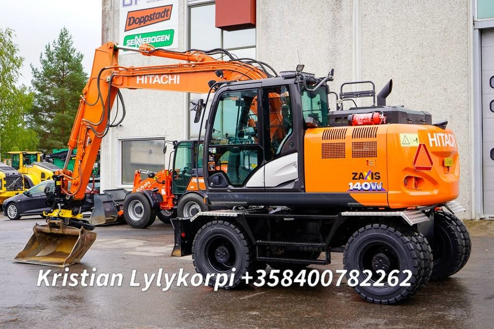 Hitachi ZX140W-6 ENGCONILLA - Gumikerekes kotró: 2 kép. Hitachi ZX140W-6 ENGCONILLA - Gumikerekes kotró: 2 kép.