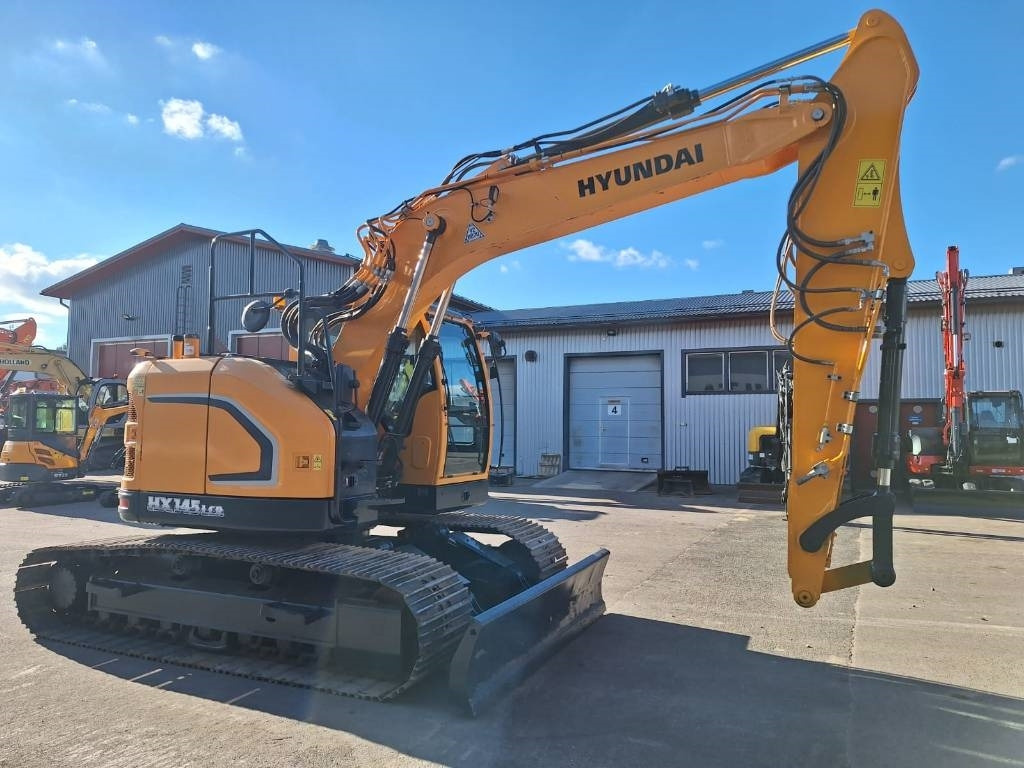 Hyundai HX145LCR DOZER - Lánctalpas kotró: 4 kép. Hyundai HX145LCR DOZER - Lánctalpas kotró: 4 kép.
