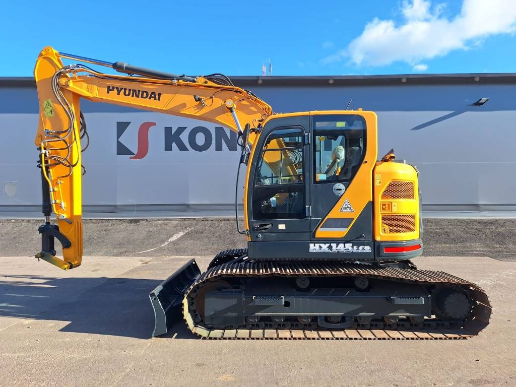 Hyundai HX145LCR DOZER - Lánctalpas kotró: 1 kép. Hyundai HX145LCR DOZER - Lánctalpas kotró: 1 kép.