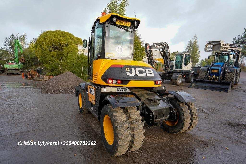 JCB 110W Hydradig PYÖRITTÄJÄLLÄ - Gumikerekes kotró: 4 kép. JCB 110W Hydradig PYÖRITTÄJÄLLÄ - Gumikerekes kotró: 4 kép.