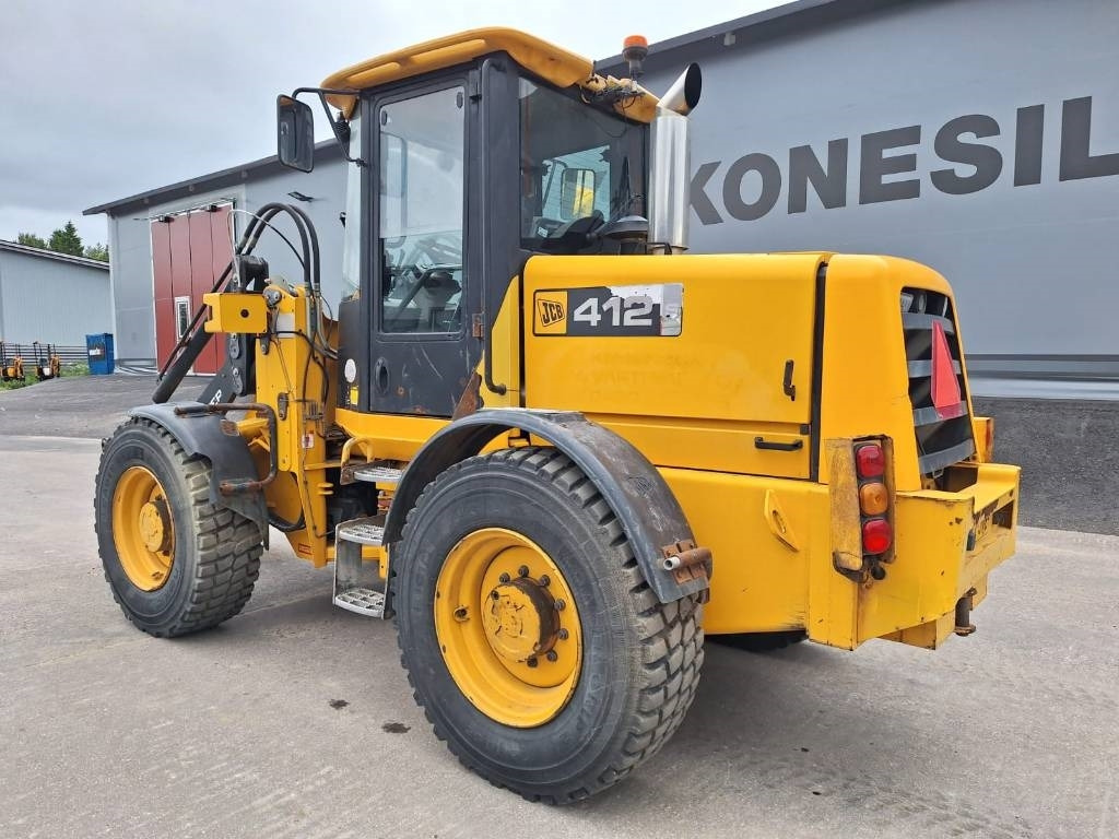 JCB MYYTY! SOLD! 412S PALAPINTARENKAAT - Gumikerekes homlokrakodó: 2 kép. JCB MYYTY! SOLD! 412S PALAPINTARENKAAT - Gumikerekes homlokrakodó: 2 kép.