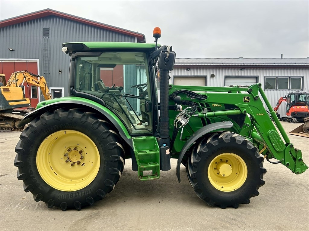 John Deere 6125 R AUTOPOWER ETUKUORMAAJALLA - Traktor: 5 kép. John Deere 6125 R AUTOPOWER ETUKUORMAAJALLA - Traktor: 5 kép.