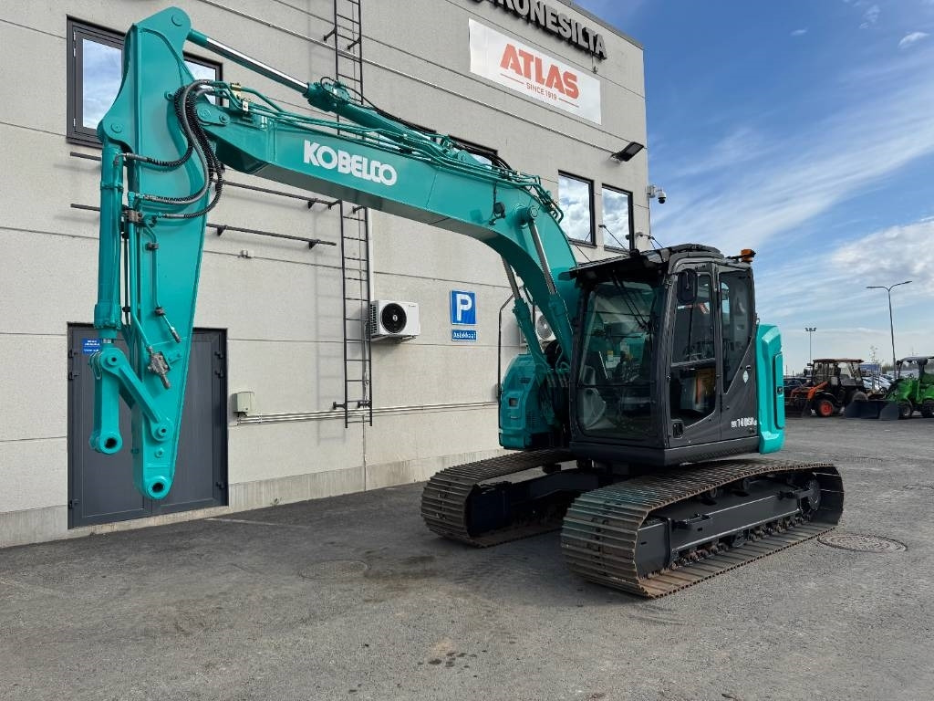 Kobelco SK140SRLC-7 - Lánctalpas kotró: 2 kép. Kobelco SK140SRLC-7 - Lánctalpas kotró: 2 kép.