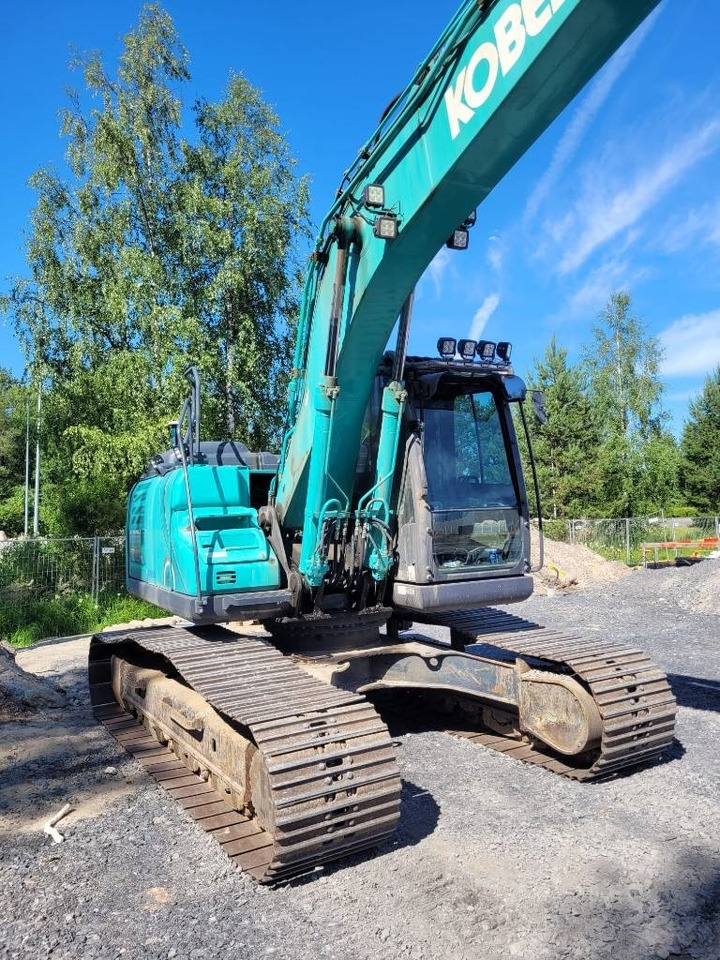 Kobelco SK180LC-10 TULOSSA - Lánctalpas kotró: 2 kép. Kobelco SK180LC-10 TULOSSA - Lánctalpas kotró: 2 kép.