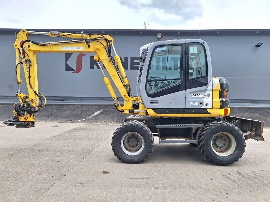 New Holland MYYTY! SOLD! MH2.6 ENGCON PIHDEILLÄ - Gumikerekes kotró: 1 kép. New Holland MYYTY! SOLD! MH2.6 ENGCON PIHDEILLÄ - Gumikerekes kotró: 1 kép.