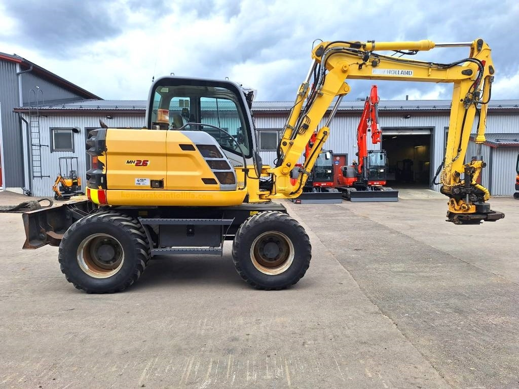 New Holland MYYTY! SOLD! MH2.6 ENGCON PIHDEILLÄ - Gumikerekes kotró: 5 kép. New Holland MYYTY! SOLD! MH2.6 ENGCON PIHDEILLÄ - Gumikerekes kotró: 5 kép.
