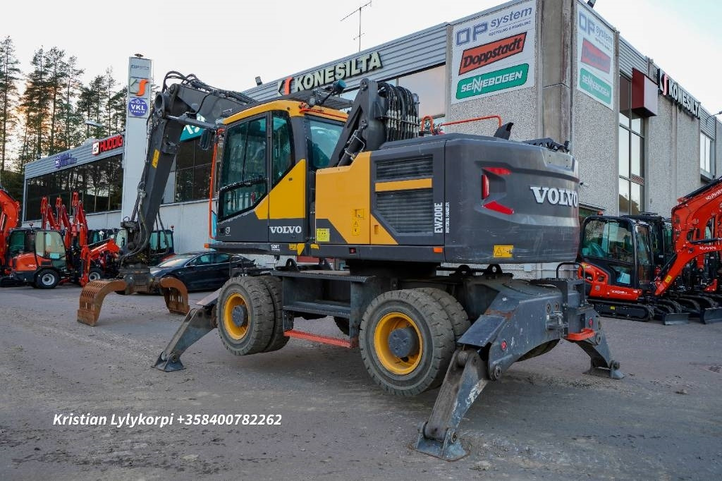 Volvo EW 200 E MH - Hulladék kotró: 2 kép. Volvo EW 200 E MH - Hulladék kotró: 2 kép.