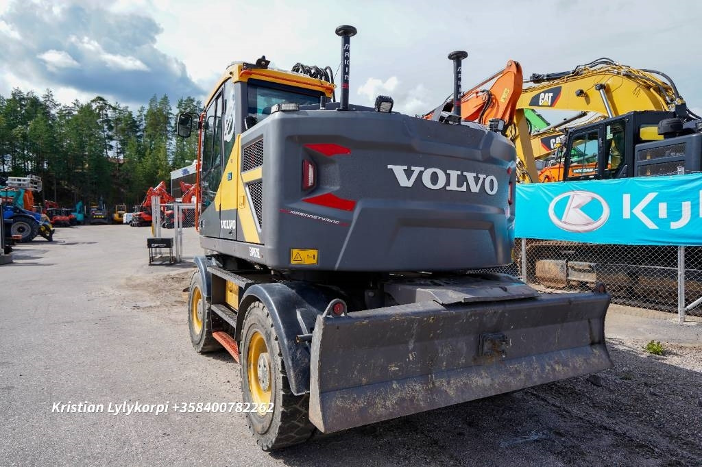 Volvo EWR170E OILQUICK PYÖRITTÄJÄ - Gumikerekes kotró: 4 kép. Volvo EWR170E OILQUICK PYÖRITTÄJÄ - Gumikerekes kotró: 4 kép.