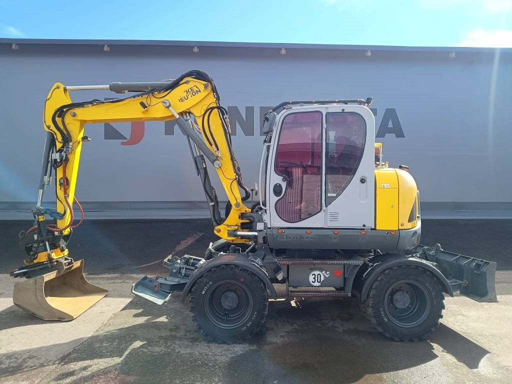 Wacker Neuson EW100 PYÖRITTÄJÄLLÄ - Gumikerekes kotró: 1 kép. Wacker Neuson EW100 PYÖRITTÄJÄLLÄ - Gumikerekes kotró: 1 kép.