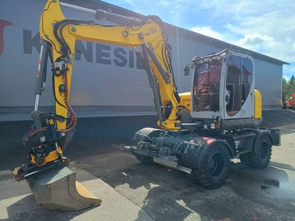 Wacker Neuson EW100 PYÖRITTÄJÄLLÄ - Gumikerekes kotró: 5 kép. Wacker Neuson EW100 PYÖRITTÄJÄLLÄ - Gumikerekes kotró: 5 kép.