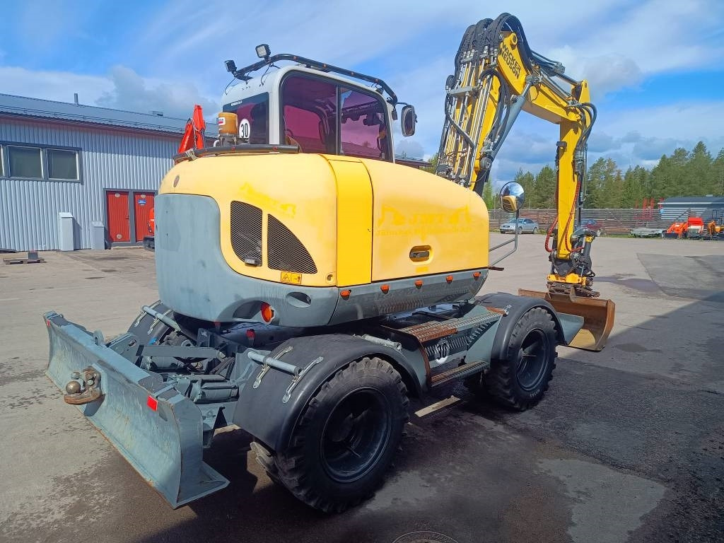 Wacker Neuson EW100 PYÖRITTÄJÄLLÄ - Gumikerekes kotró: 3 kép. Wacker Neuson EW100 PYÖRITTÄJÄLLÄ - Gumikerekes kotró: 3 kép.