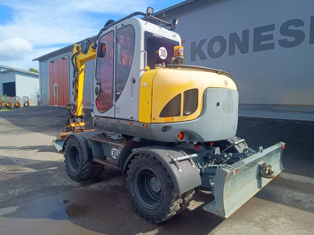 Wacker Neuson EW100 PYÖRITTÄJÄLLÄ - Gumikerekes kotró: 2 kép. Wacker Neuson EW100 PYÖRITTÄJÄLLÄ - Gumikerekes kotró: 2 kép.