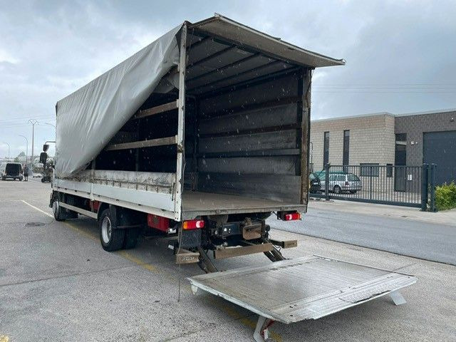 Renault Midlum dXi220-12. Klima. - Ponyvás teherautó: 2 kép. Renault Midlum dXi220-12. Klima. - Ponyvás teherautó: 2 kép.