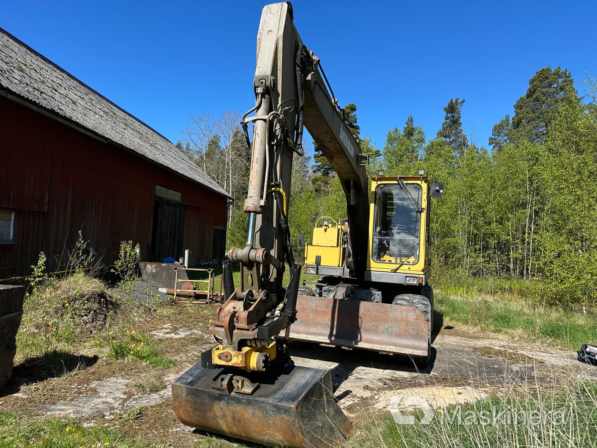 Åkerman EW150C Hjulgrävare Åkerman EW150C - Lánctalpas kotró: 2 kép. Åkerman EW150C Hjulgrävare Åkerman EW150C - Lánctalpas kotró: 2 kép.