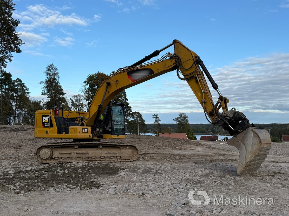 Lánctalpas kotró Grävmaskin CAT 323 Next Generation: 10 kép.