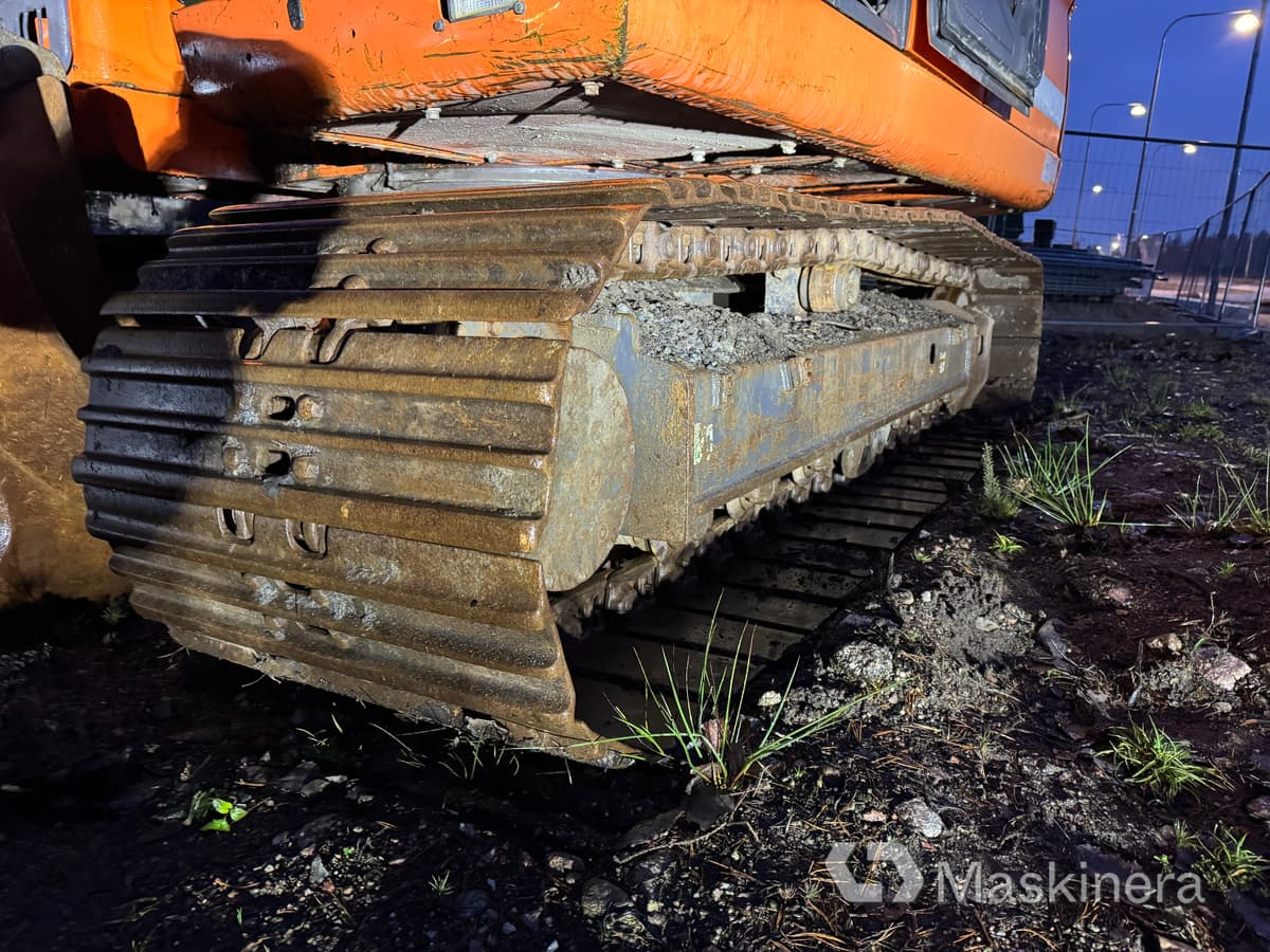 Lánctalpas kotró Grävmaskin Doosan DX140LC: 36 kép. Lánctalpas kotró Grävmaskin Doosan DX140LC: 36 kép.