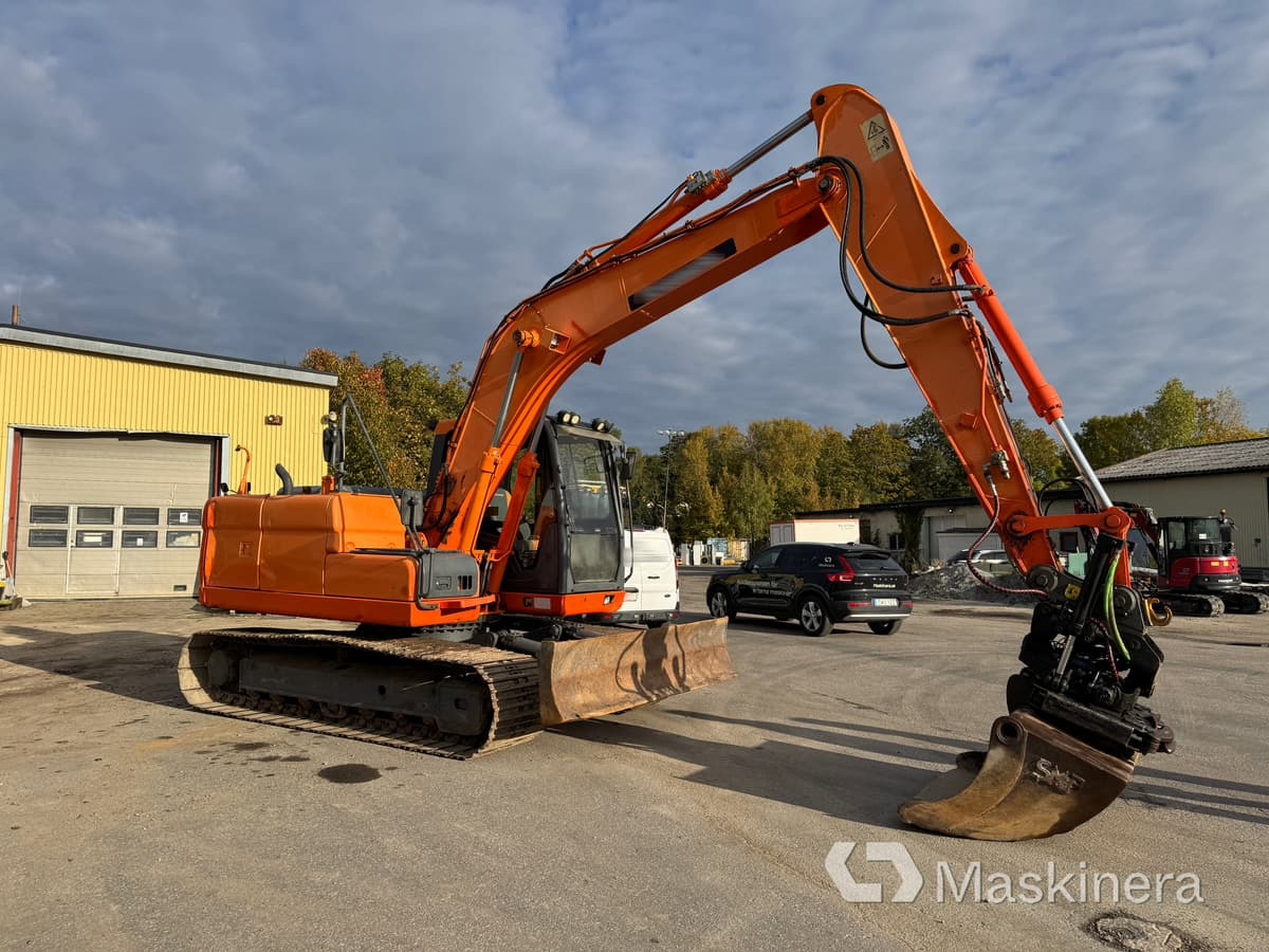 Grävmaskin Doosan DX140LC - Lánctalpas kotró: 4 kép. Grävmaskin Doosan DX140LC - Lánctalpas kotró: 4 kép.
