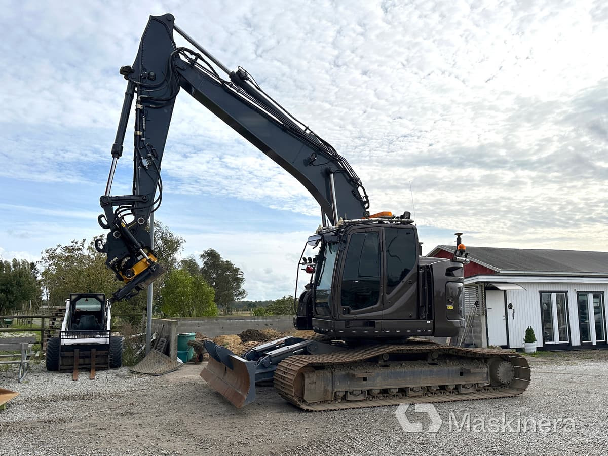 Grävmaskin Kobelco SK270SRNLC-5 - Lánctalpas kotró: 1 kép. Grävmaskin Kobelco SK270SRNLC-5 - Lánctalpas kotró: 1 kép.