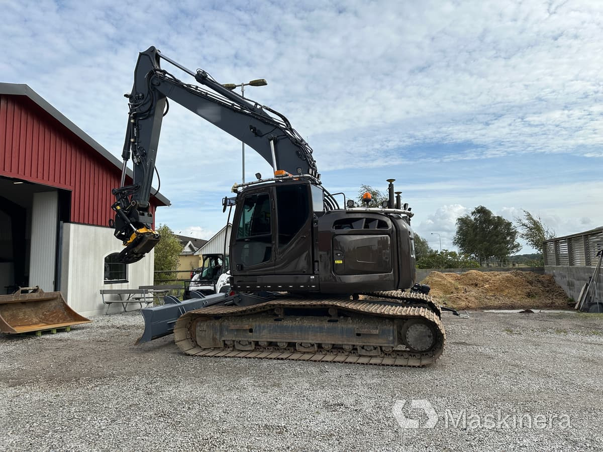 Grävmaskin Kobelco SK270SRNLC-5 - Lánctalpas kotró: 2 kép. Grävmaskin Kobelco SK270SRNLC-5 - Lánctalpas kotró: 2 kép.