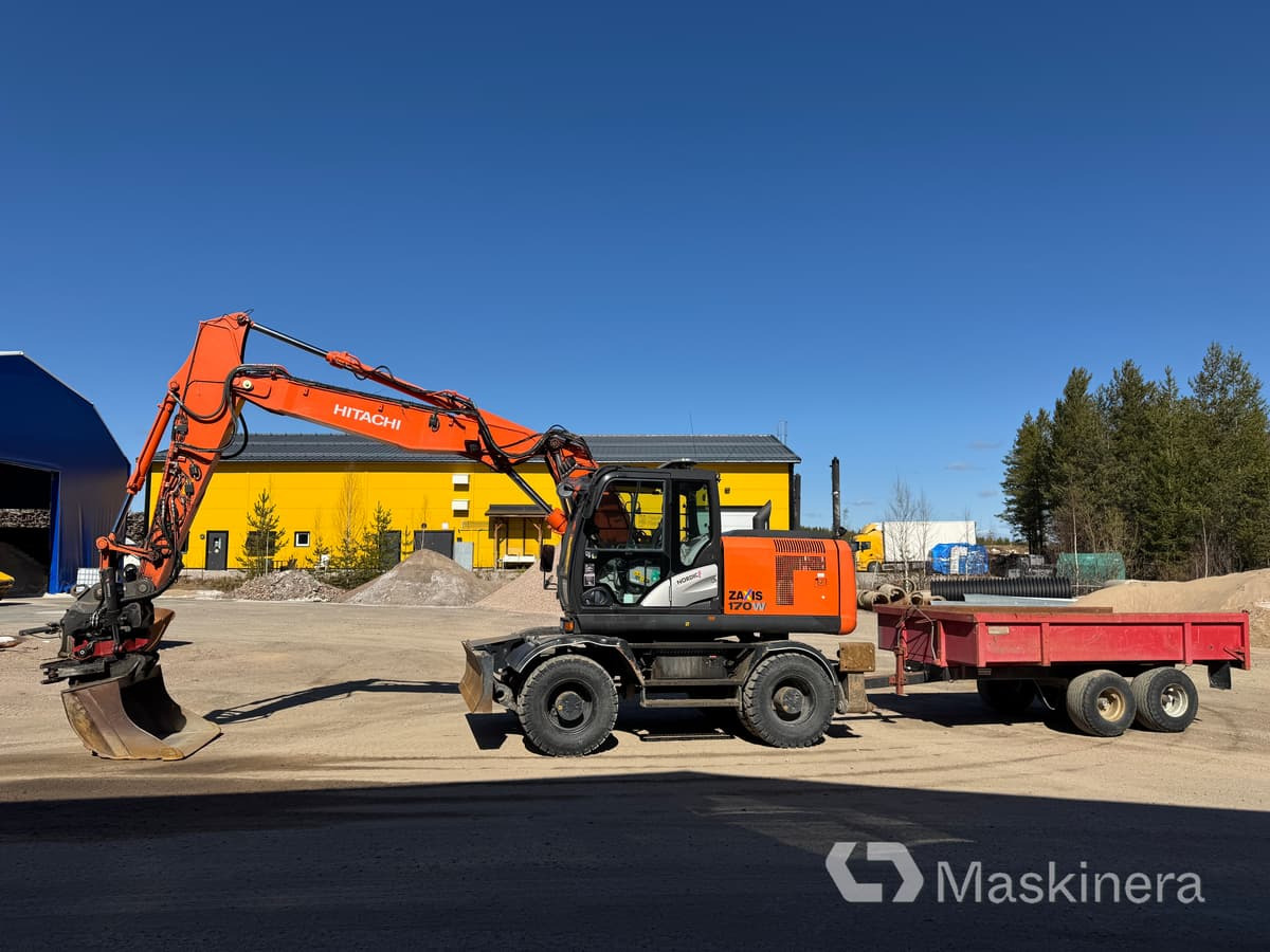 Hitachi ZX170W-5B Hjulgrävare Hitachi ZX170W med vagn - Lánctalpas kotró: 2 kép. Hitachi ZX170W-5B Hjulgrävare Hitachi ZX170W med vagn - Lánctalpas kotró: 2 kép.