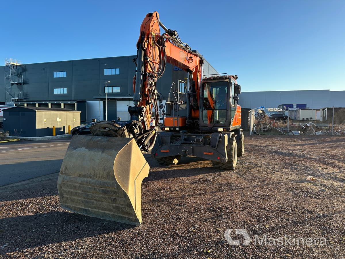 Hjulgrävare Doosan DX160W-5 - Lánctalpas kotró: 2 kép. Hjulgrävare Doosan DX160W-5 - Lánctalpas kotró: 2 kép.