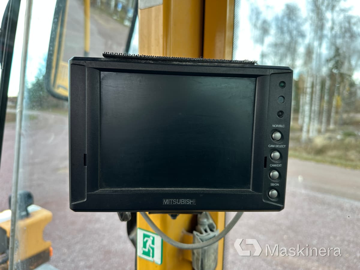 Gumikerekes homlokrakodó Hjullastare Volvo L110E: 49 kép.