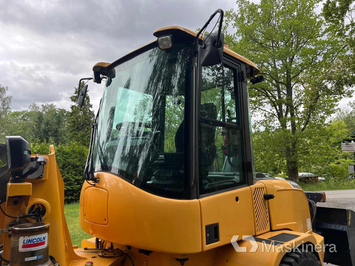 Gumikerekes homlokrakodó Hjullastare Volvo L35G med tillbehör: 11 kép.